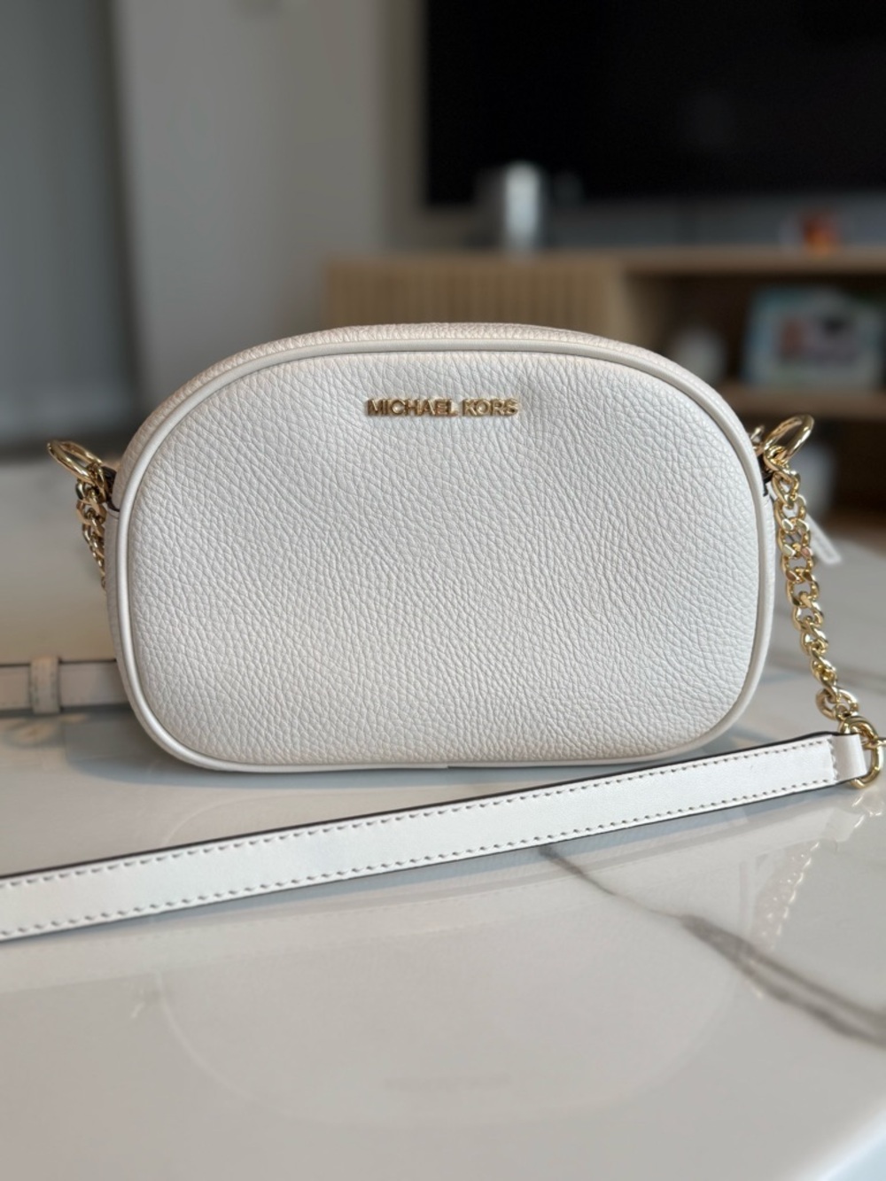 Michael Kors White Pebbled Leather Oval Crossbody with Gold Hardware